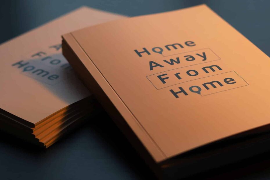 Printed copies of Home Away from Home, a publication by Christie Chan (2022).